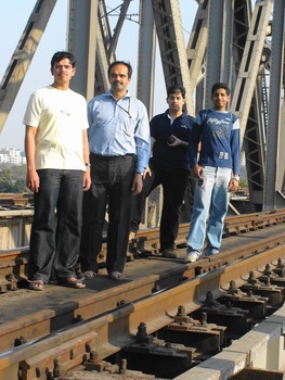 Railfans Shantanu Kulkarni, Pradeep Galgali, Bhushan Kale and Karan Desai cue up for a pose at Ulhas Bridge.  (Arzan Kotval)