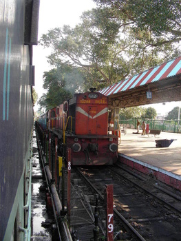 Rishikesh Passenger: Here comes another LKO WDG-3 # 13288 leading a passenger train from Rishikesh over the Pf#1.  What a waste 
