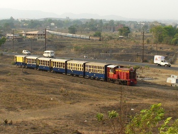 I was quite lucky enough to capture the Matheran bound Toy Train and the Cst Kanyakumari Express in one shot at Neral outer. (Ar