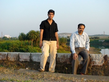 Railfans Tushar Dhake (left) and Pradeep Galgali strike a pose at the Kaloo bridge near Titvala station. (Arzan Kotval)