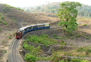 The Neral - Matheran Toy Train gracefully climbs the massive curve, about 2kms from Neral Jn. (Arzan Kotval)
