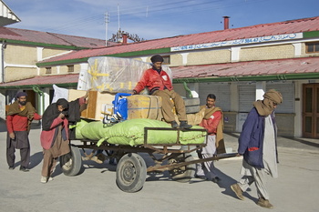 Coolies carrying Luggage for loading in The  luggage van, Quetta station