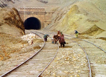 Railway Gangmen Repairing the tracks after a landslide near a tunnel entrance on chaman section