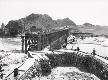 Chiniot Railway Bridge under construction in 1930, Shiwal Temple in the background