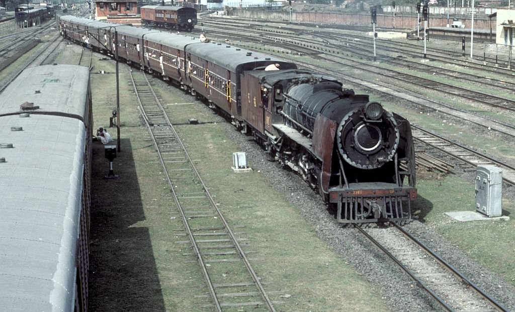 YP #2161 enters Katihar station with a well loaded train on 27 February 1992. By Roger Morris - Buriton Wheelbarrow Rail Photos.