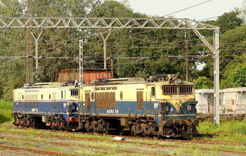 A profile of twin KYN WCG-2# 20160 resting peacefully between Karjat and Palasdhari stations. Image taken from a Khopoli Emu. (A