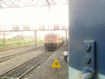 (For Loco Database) WAP-4 #22374 leaving Howrah Junction with the Howrah-Ruxaul Mithila Express, while the Bolpur-Howrah Shantin