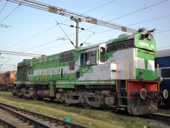 WDM3A #16502 of Lucknow (LKO) fitted with Electronic Fuel Injection seen in unique green and white livery at Lucknow. Perhaps it