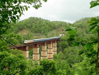 LGD WAP-7# 30272 with Dakshin Express comes out of the tunnel and gracefully passes through the biggest viaduct of Dharakhoh - M