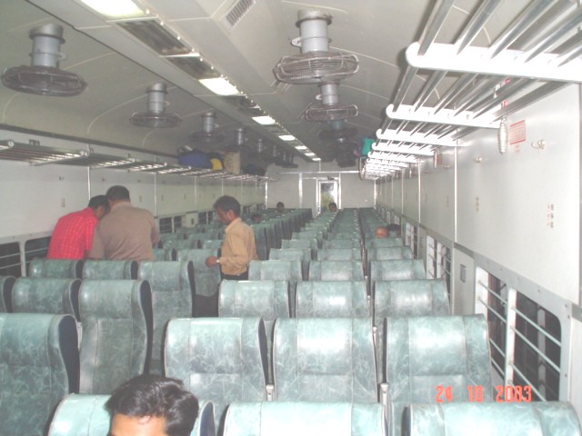 Interior_of_a_second_class_seating_coach_in_LTT_Madgaon_Jan_Shatabdi_Photo_by_Saurabh_Jha.jpg