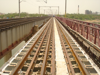 Gantlated track on bridge