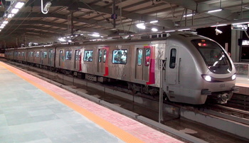 Ghatkopar - Versova Metro arrives at Jagruti Nagar for its scheduled halt