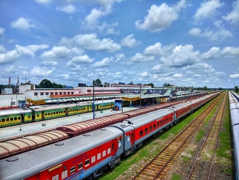 A Parade of Colours at New Jalpaiguri

Trains Can be seen here are  A Stationary LHB Rake, BCNA, New Bongaigaon Bound DEMU, Ho